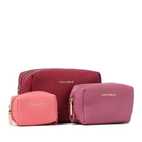 Set Tre Pochette da Viaggio COCCINELLE in Pelle Garnet Red - Pulp Pink - Hyper Pink